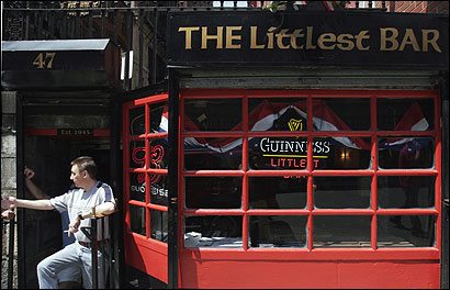 Bartender Stephen Higgin took a cigarette break yesterday.